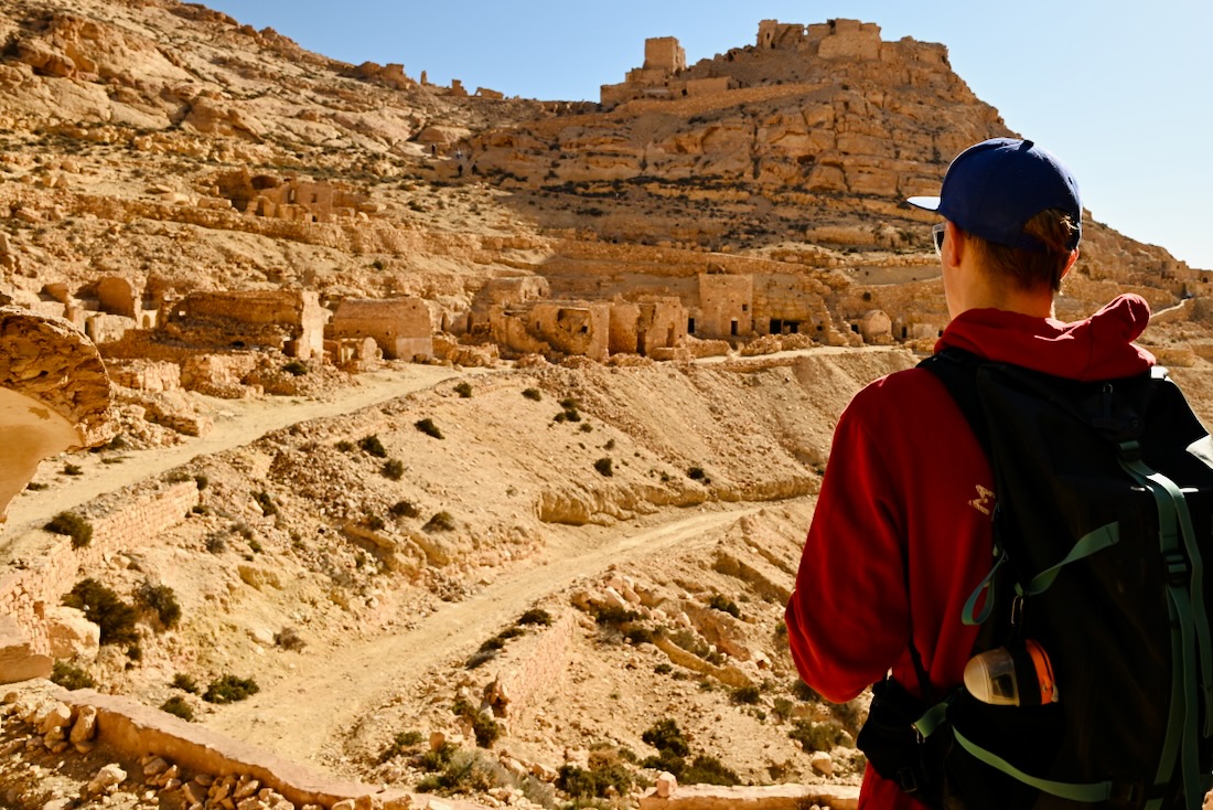 Noctilight Schutzhülle mit der Petzl Tikka Core am Rucksack